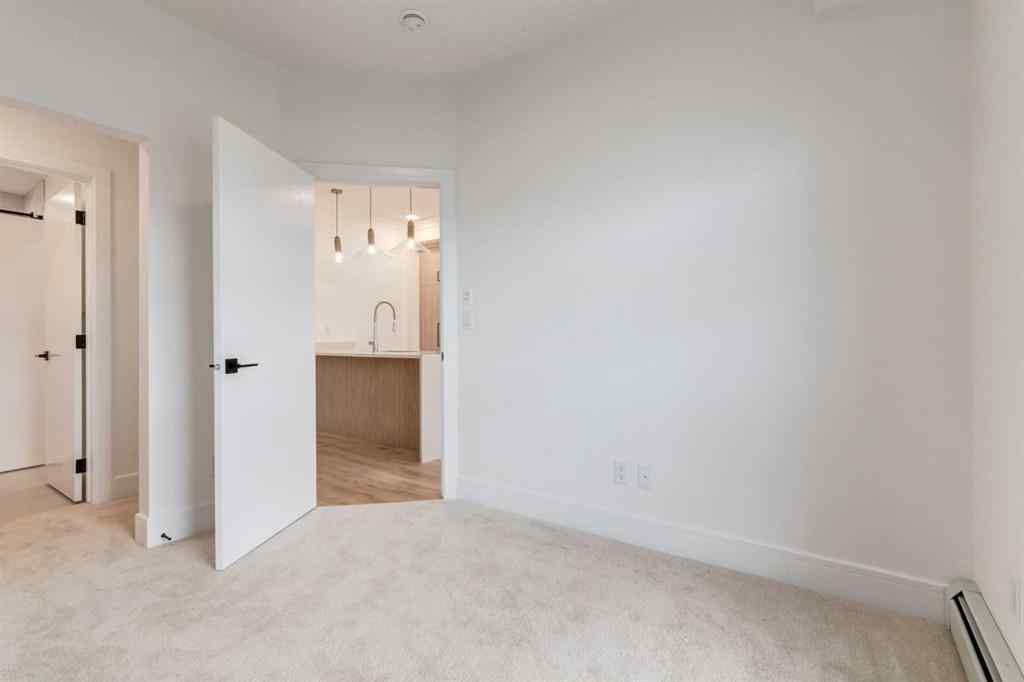 MLS® A2260164 - Unit #406 330 Dieppe Drive SW in Currie Barracks Calgary, Residential