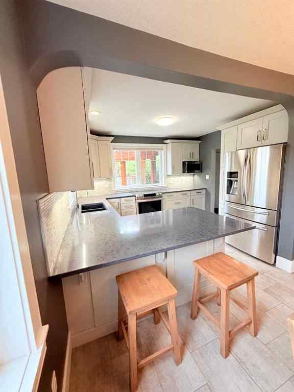 MLS® A2260168 - 10103 95 Avenue  in Swanavon Grande Prairie, Residential