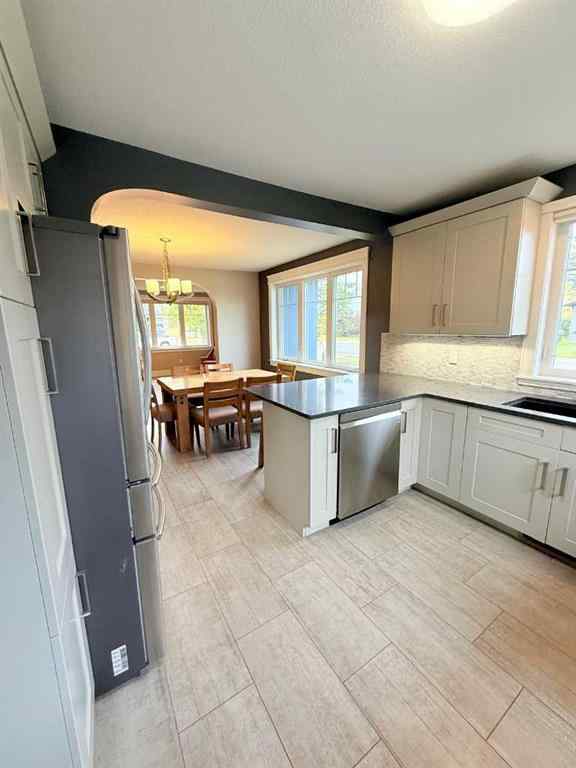 MLS® A2260168 - 10103 95 Avenue  in Swanavon Grande Prairie, Residential