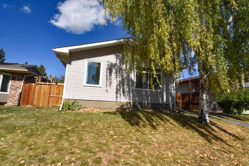MLS® A2260181 - 112 Woodvale Road SW in Woodlands Calgary, Residential