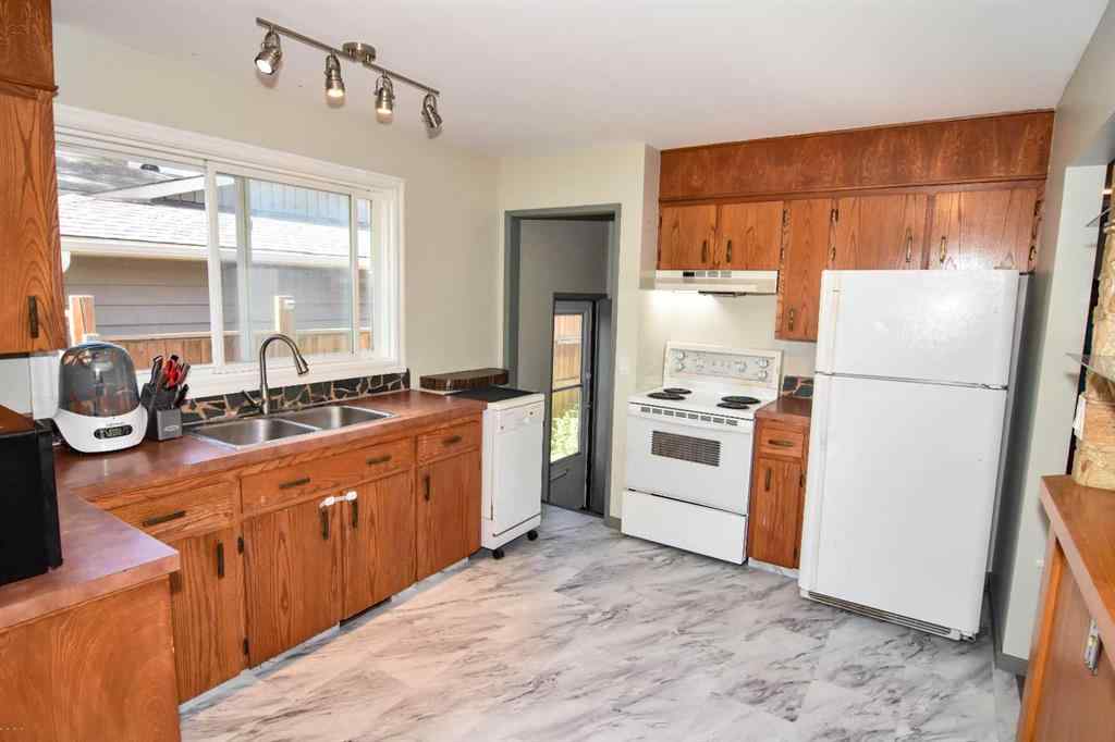 MLS® A2260181 - 112 Woodvale Road SW in Woodlands Calgary, Residential