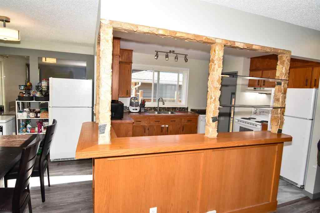 MLS® A2260181 - 112 Woodvale Road SW in Woodlands Calgary, Residential