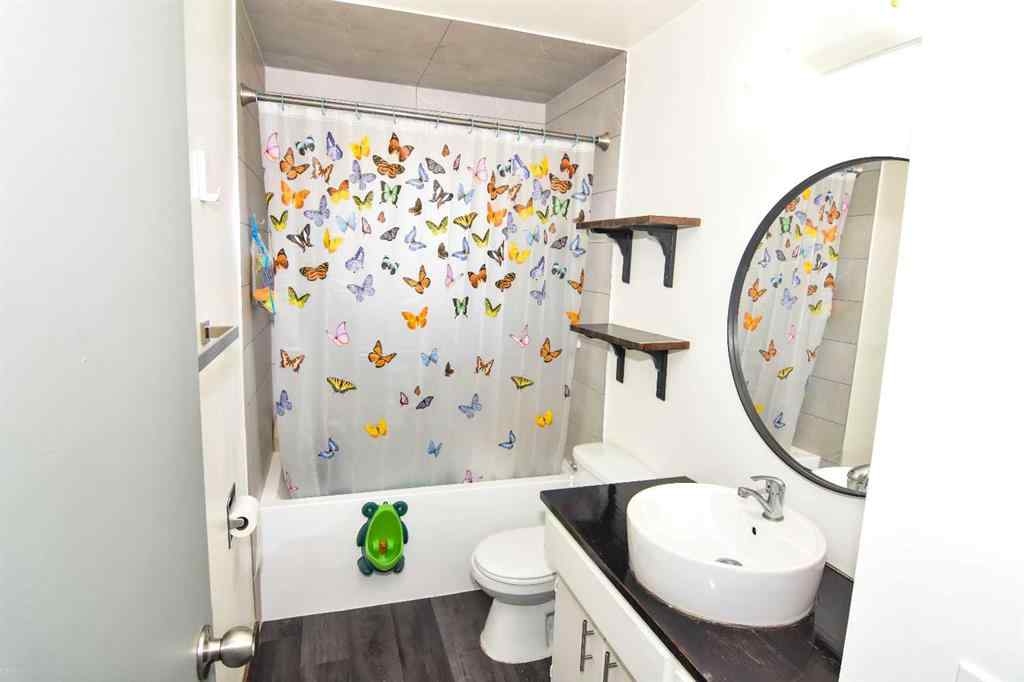 MLS® A2260181 - 112 Woodvale Road SW in Woodlands Calgary, Residential