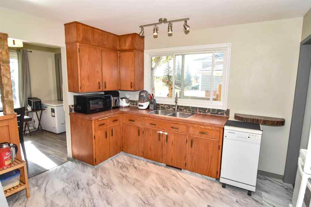MLS® A2260181 - 112 Woodvale Road SW in Woodlands Calgary, Residential