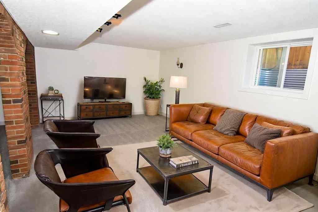 MLS® A2260181 - 112 Woodvale Road SW in Woodlands Calgary, Residential