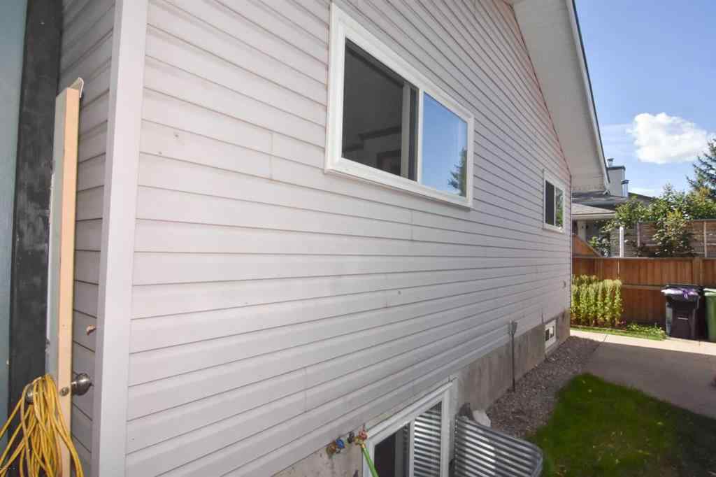 MLS® A2260181 - 112 Woodvale Road SW in Woodlands Calgary, Residential