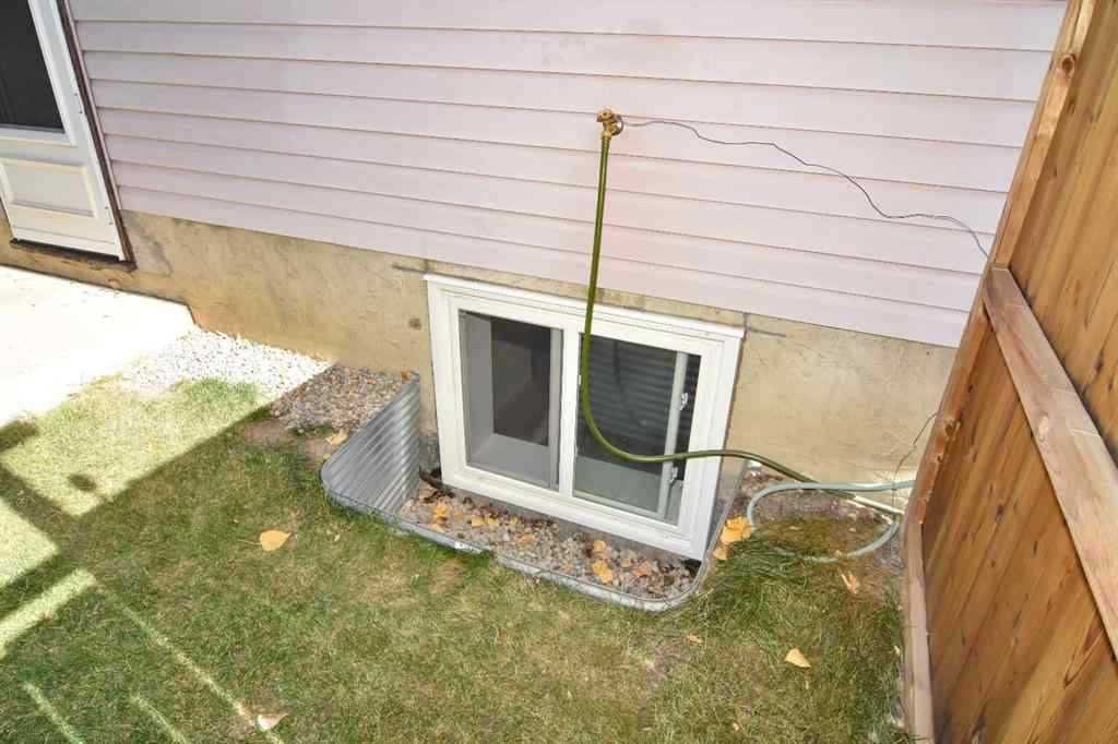 MLS® A2260181 - 112 Woodvale Road SW in Woodlands Calgary, Residential