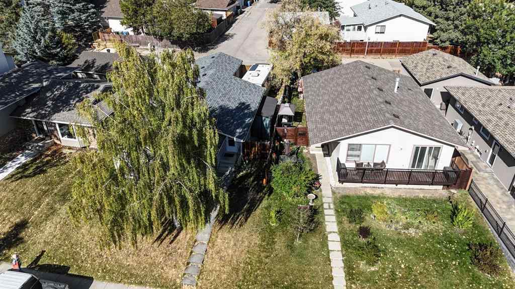MLS® A2260181 - 112 Woodvale Road SW in Woodlands Calgary, Residential