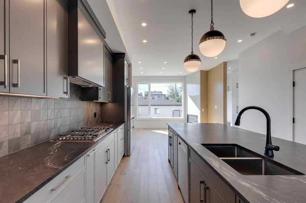 MLS® A2260186 - 2015 23 Avenue NW in Banff Trail Calgary, Residential