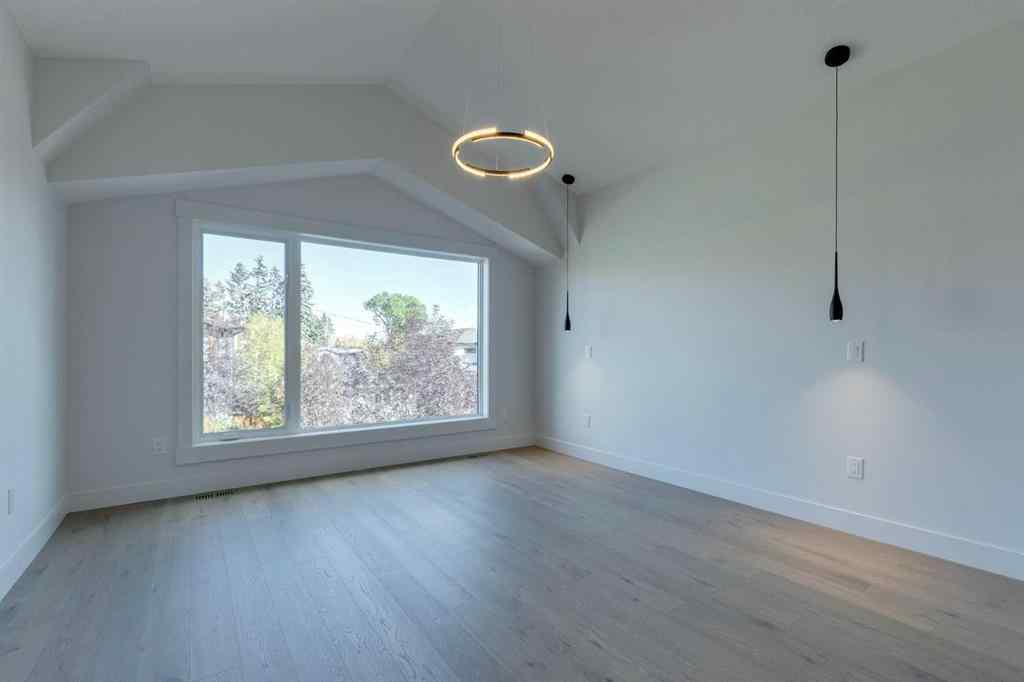 MLS® A2260186 - 2015 23 Avenue NW in Banff Trail Calgary, Residential