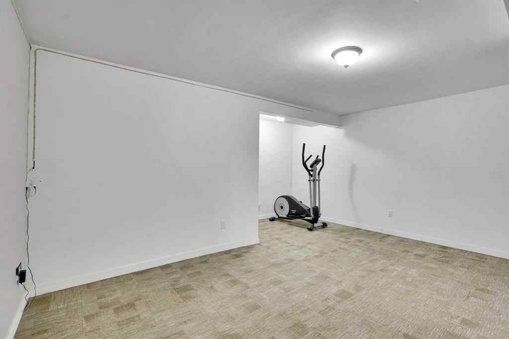 MLS® A2260194 - Unit #104 6103 Madigan Drive NE in Marlborough Park Calgary, Residential