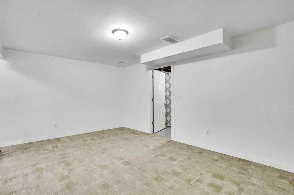 MLS® A2260194 - Unit #104 6103 Madigan Drive NE in Marlborough Park Calgary, Residential