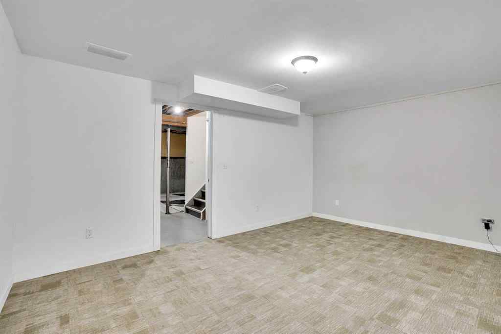 MLS® A2260194 - Unit #104 6103 Madigan Drive NE in Marlborough Park Calgary, Residential