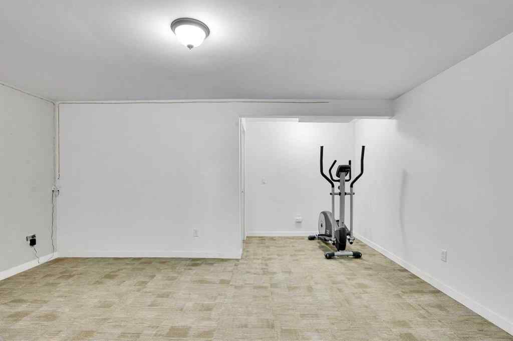 MLS® A2260194 - Unit #104 6103 Madigan Drive NE in Marlborough Park Calgary, Residential