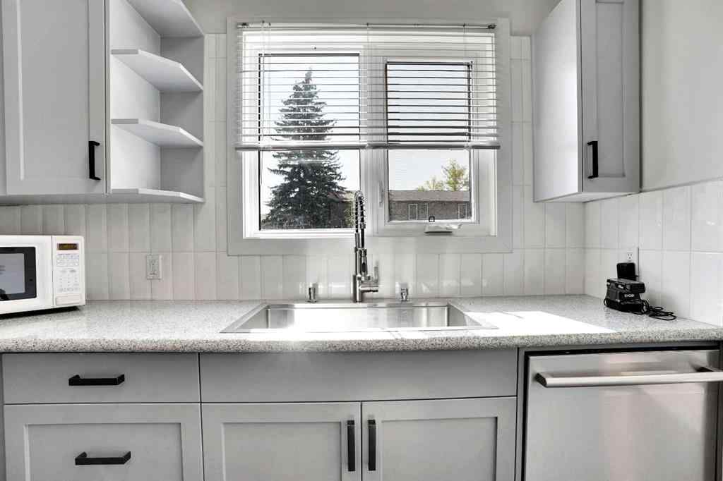 MLS® A2260194 - Unit #104 6103 Madigan Drive NE in Marlborough Park Calgary, Residential