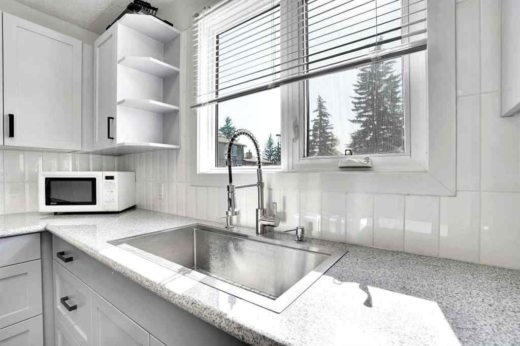 MLS® A2260194 - Unit #104 6103 Madigan Drive NE in Marlborough Park Calgary, Residential