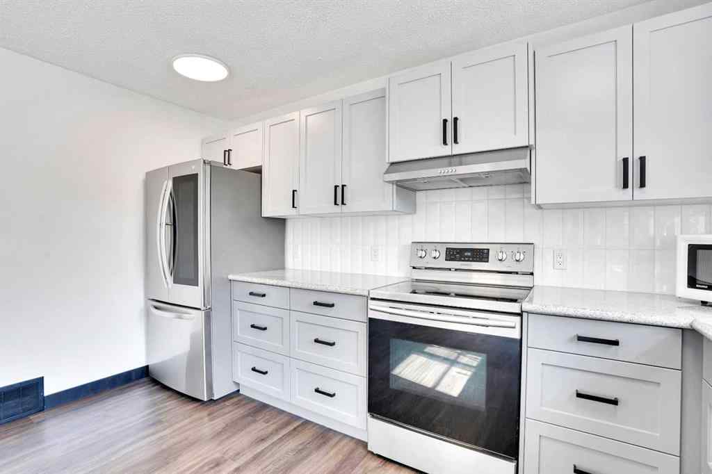 MLS® A2260194 - Unit #104 6103 Madigan Drive NE in Marlborough Park Calgary, Residential