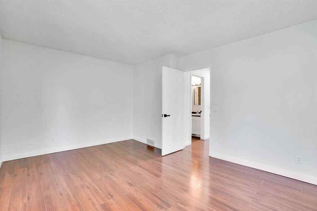 MLS® A2260194 - Unit #104 6103 Madigan Drive NE in Marlborough Park Calgary, Residential