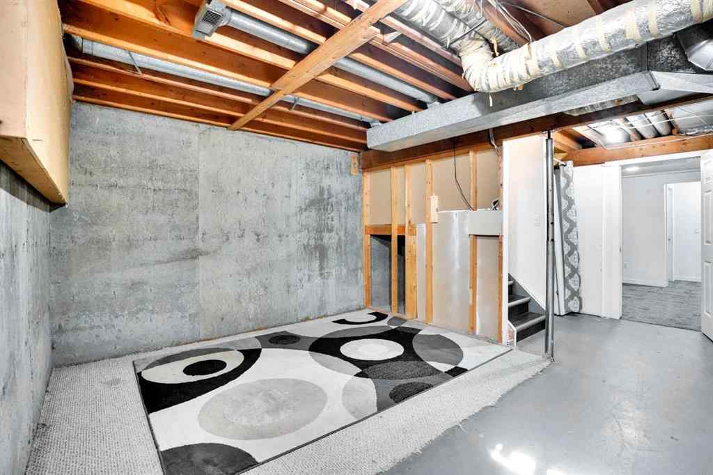 MLS® A2260194 - Unit #104 6103 Madigan Drive NE in Marlborough Park Calgary, Residential