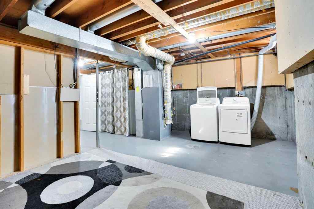 MLS® A2260194 - Unit #104 6103 Madigan Drive NE in Marlborough Park Calgary, Residential