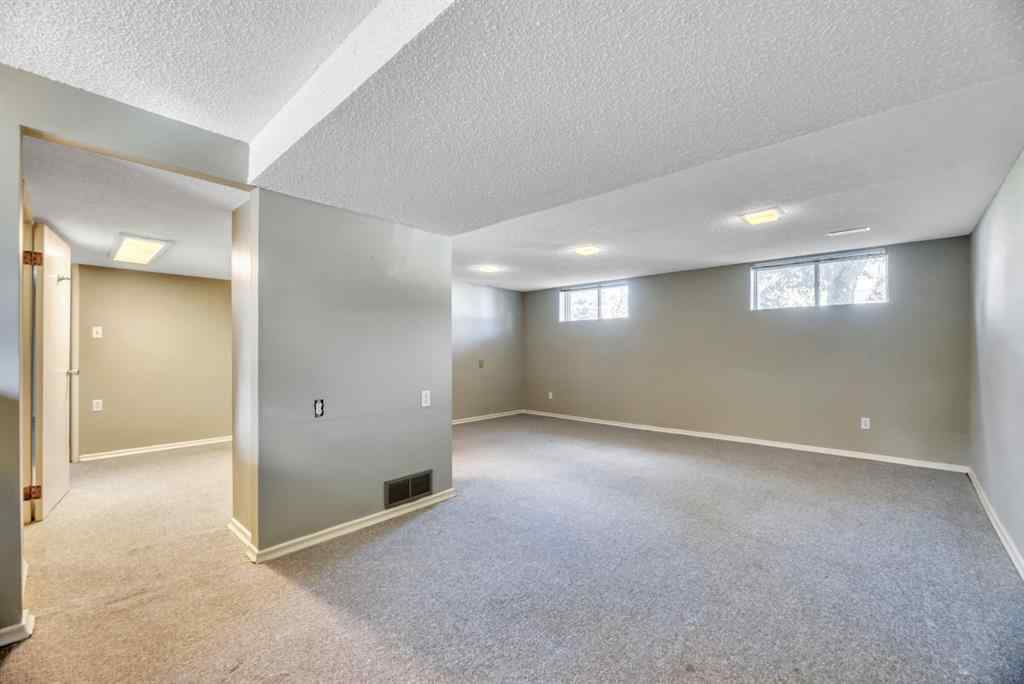 MLS® A2260198 - 23 Brazeau Crescent SW in Braeside Calgary, Residential