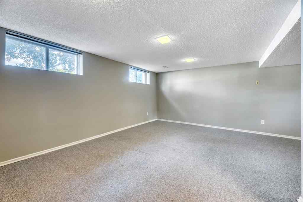 MLS® A2260198 - 23 Brazeau Crescent SW in Braeside Calgary, Residential