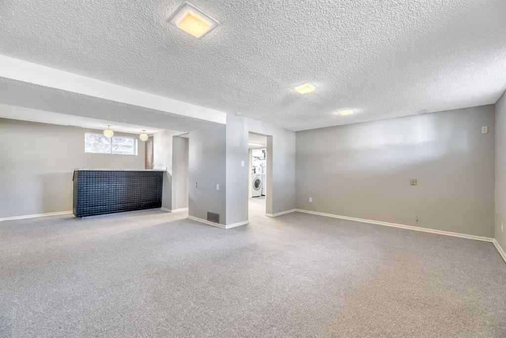 MLS® A2260198 - 23 Brazeau Crescent SW in Braeside Calgary, Residential