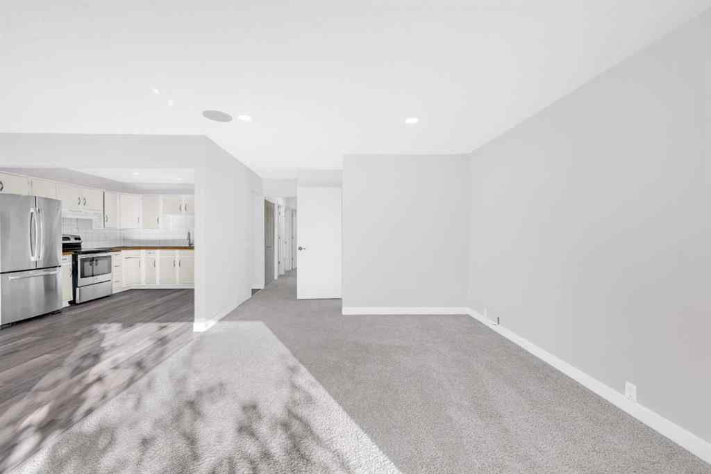 MLS® A2260226 - 325 Woodvale Crescent SW in Woodlands Calgary, Residential