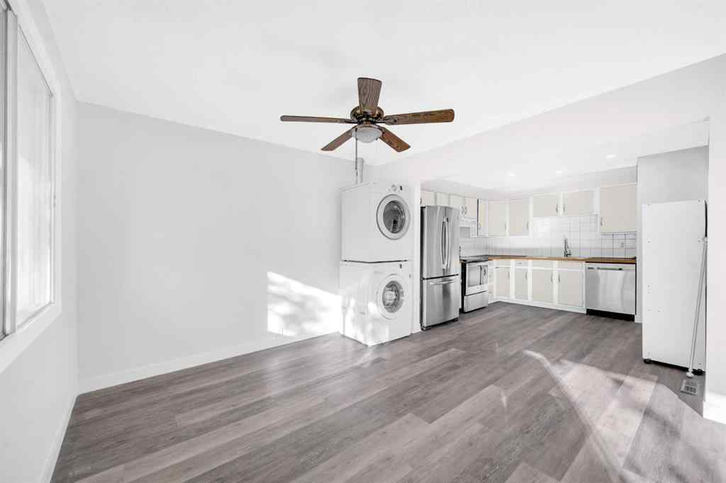 MLS® A2260226 - 325 Woodvale Crescent SW in Woodlands Calgary, Residential