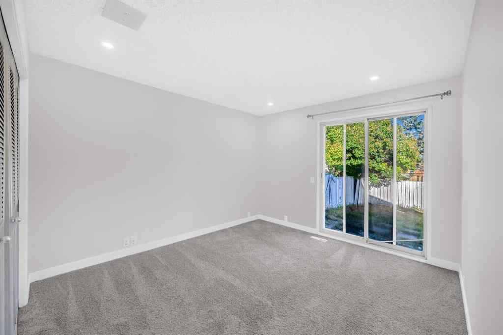 MLS® A2260226 - 325 Woodvale Crescent SW in Woodlands Calgary, Residential