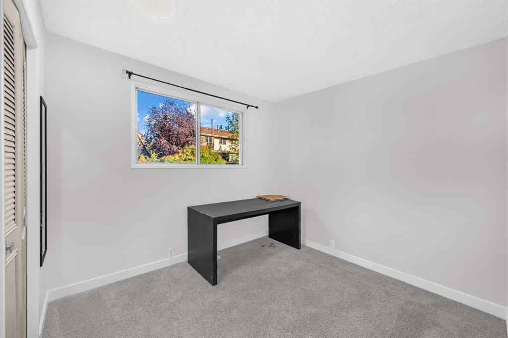 MLS® A2260226 - 325 Woodvale Crescent SW in Woodlands Calgary, Residential