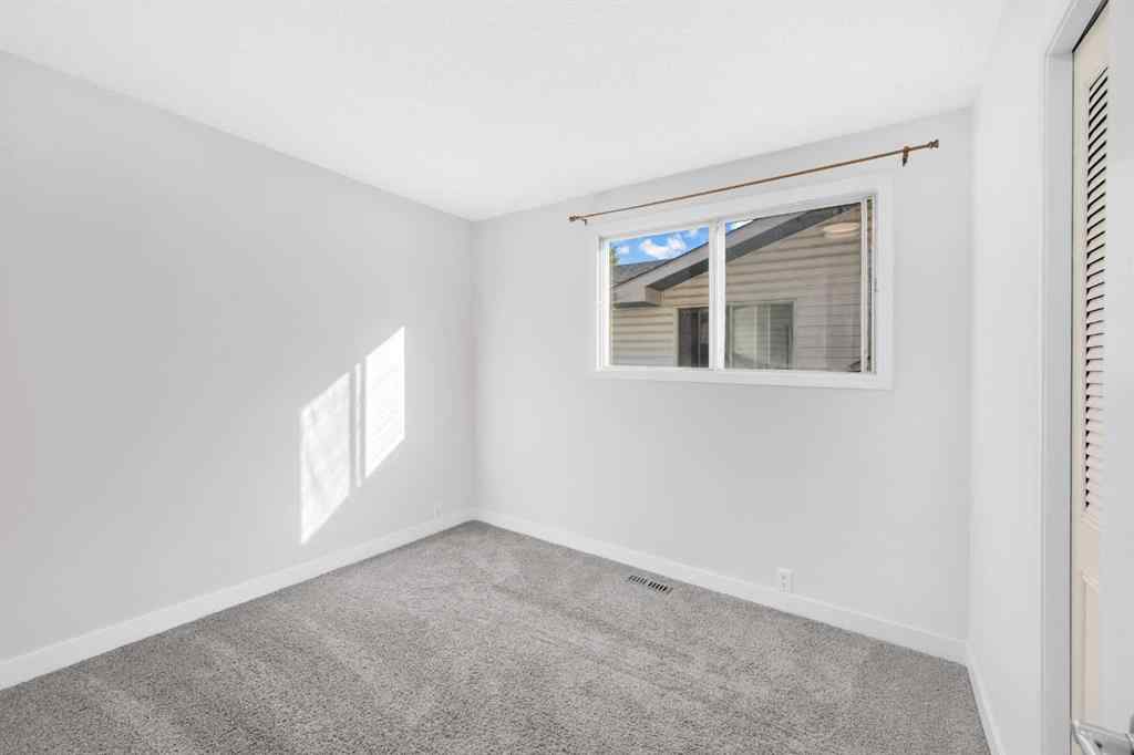 MLS® A2260226 - 325 Woodvale Crescent SW in Woodlands Calgary, Residential