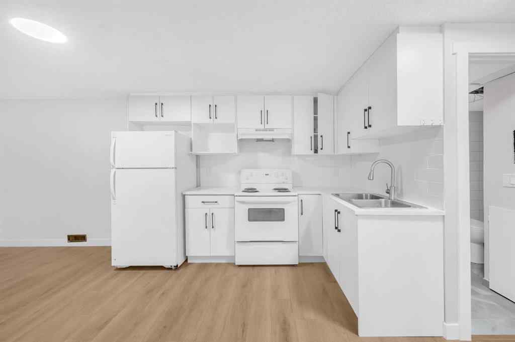 MLS® A2260226 - 325 Woodvale Crescent SW in Woodlands Calgary, Residential