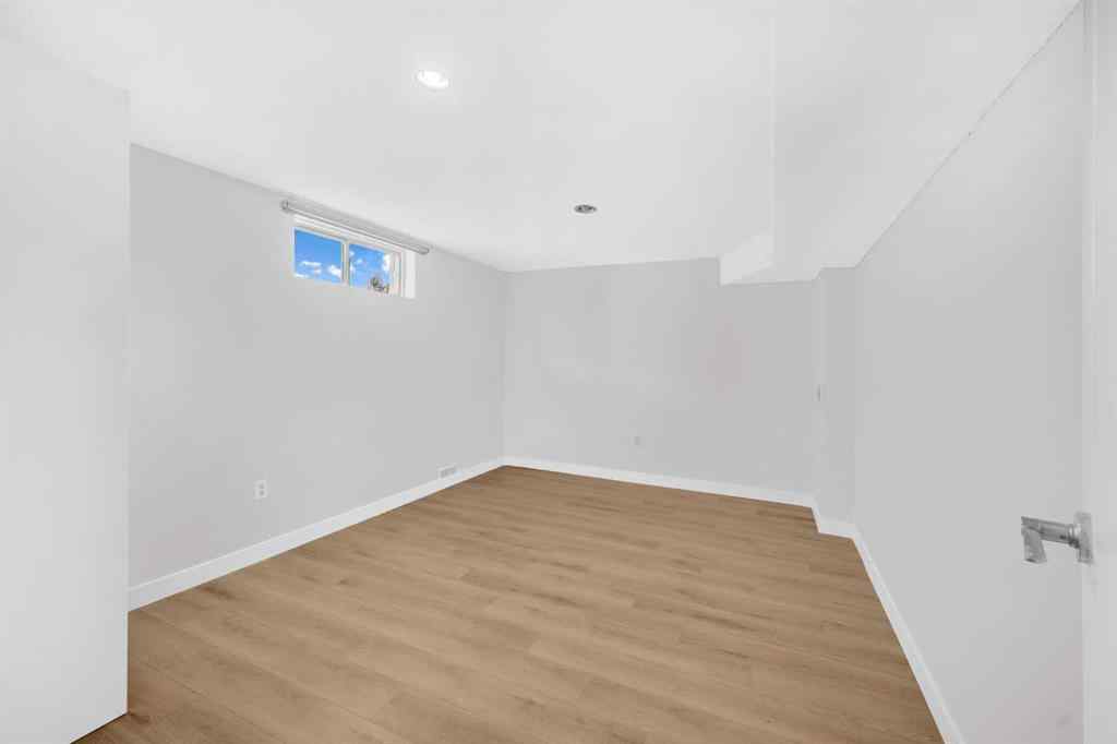 MLS® A2260226 - 325 Woodvale Crescent SW in Woodlands Calgary, Residential