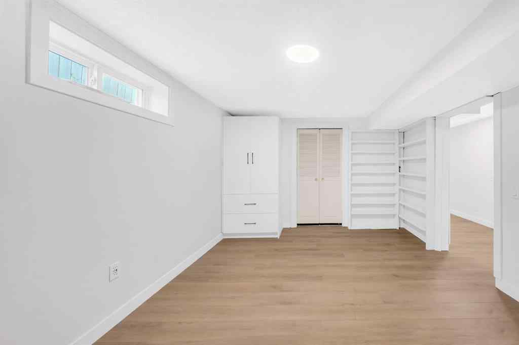 MLS® A2260226 - 325 Woodvale Crescent SW in Woodlands Calgary, Residential