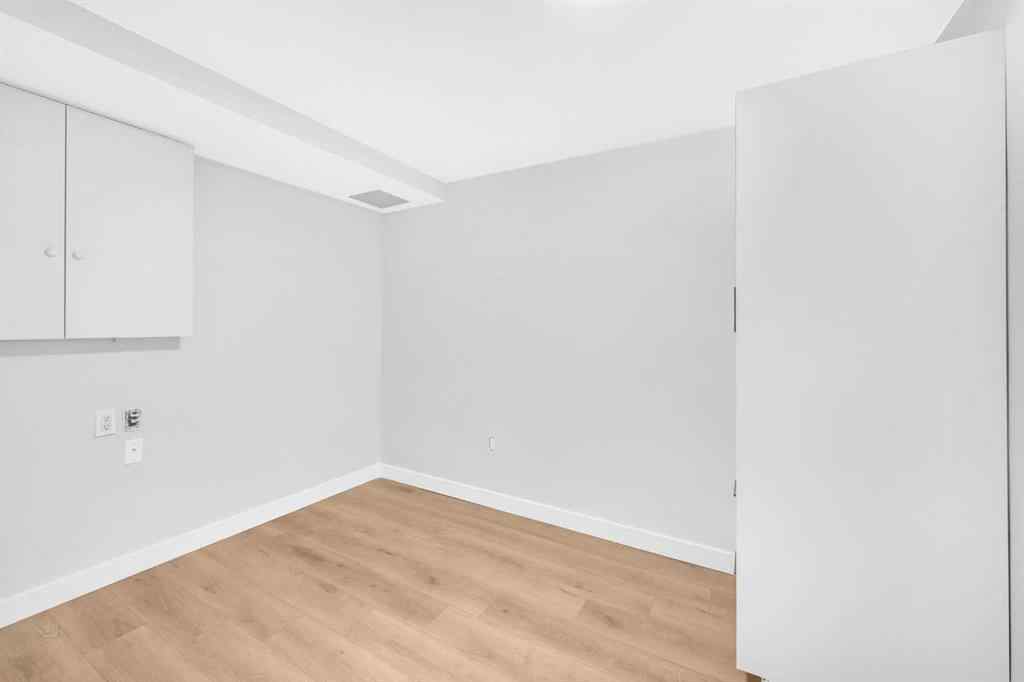 MLS® A2260226 - 325 Woodvale Crescent SW in Woodlands Calgary, Residential