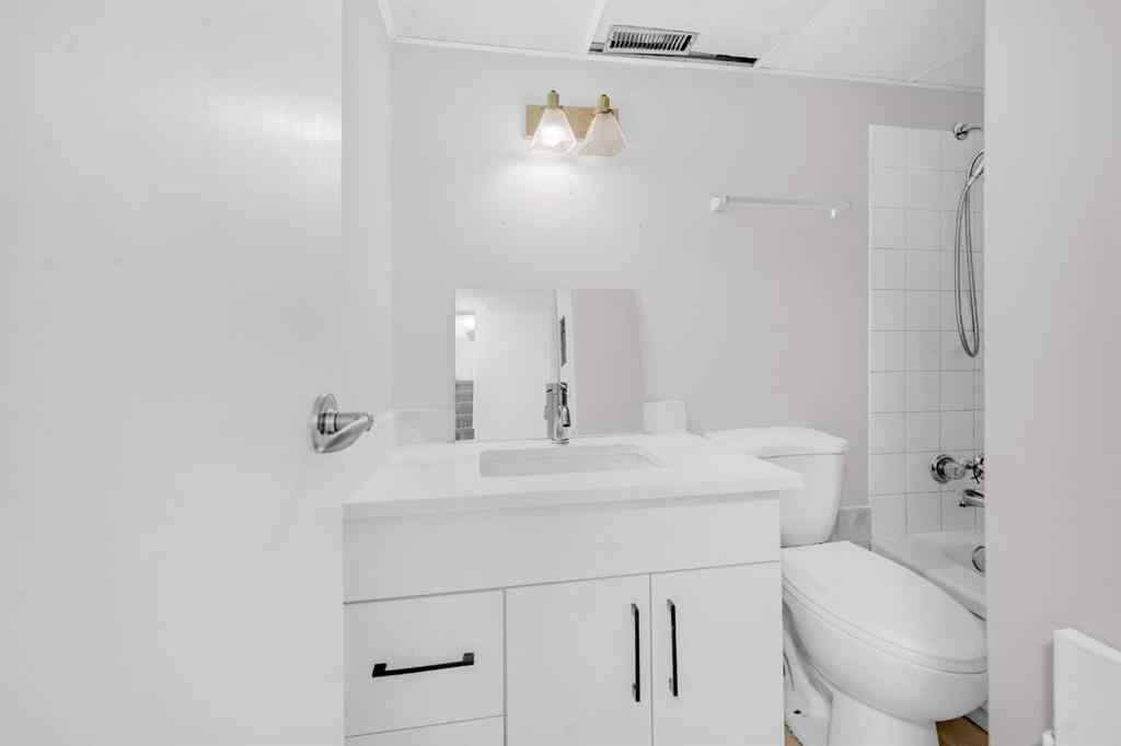 MLS® A2260226 - 325 Woodvale Crescent SW in Woodlands Calgary, Residential