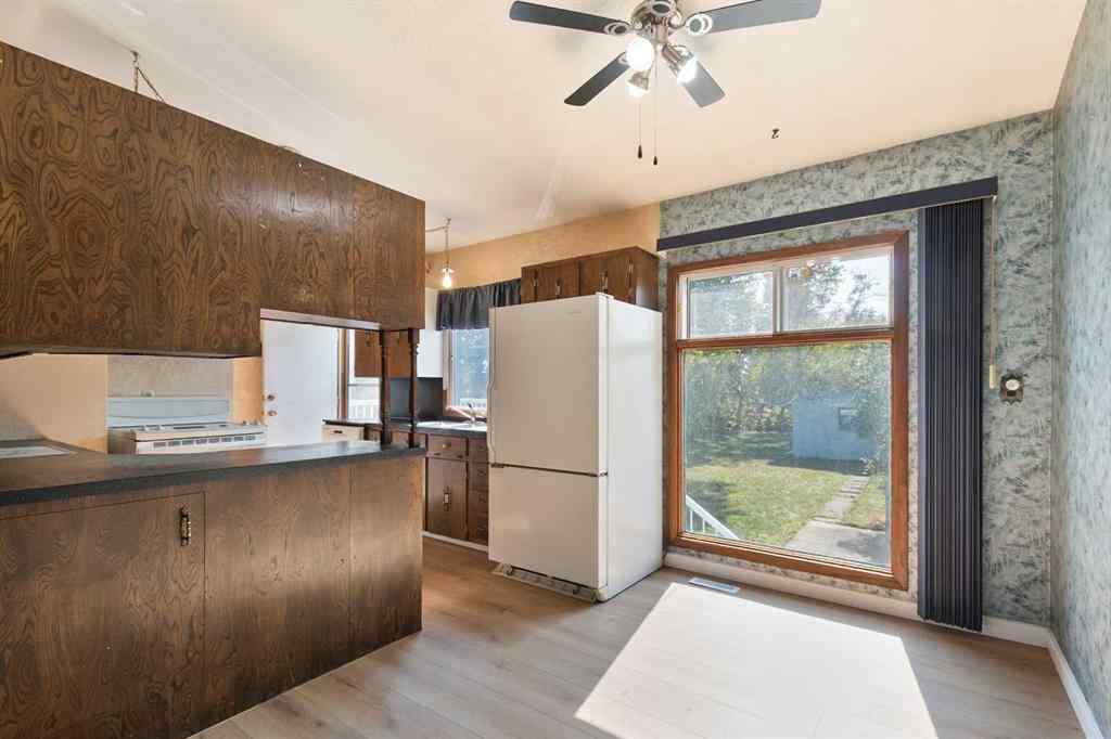 MLS® A2260229 - 433 1 Avenue NE in The Village Airdrie, Residential