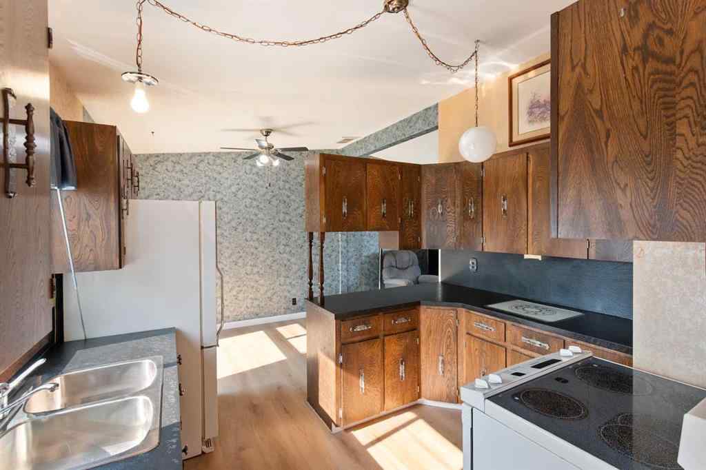 MLS® A2260229 - 433 1 Avenue NE in The Village Airdrie, Residential