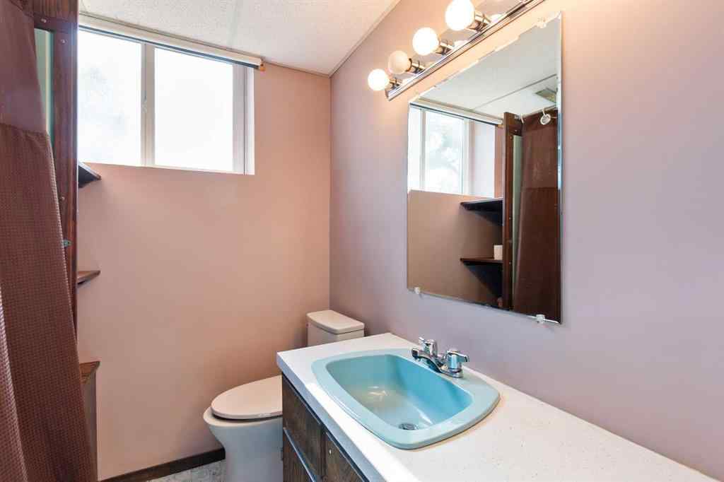 MLS® A2260229 - 433 1 Avenue NE in The Village Airdrie, Residential