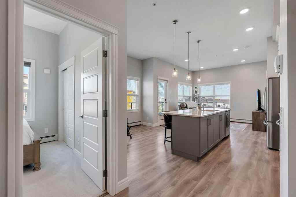 MLS® A2260242 - Unit #418 19661 40 Street SE in Seton Calgary, Residential