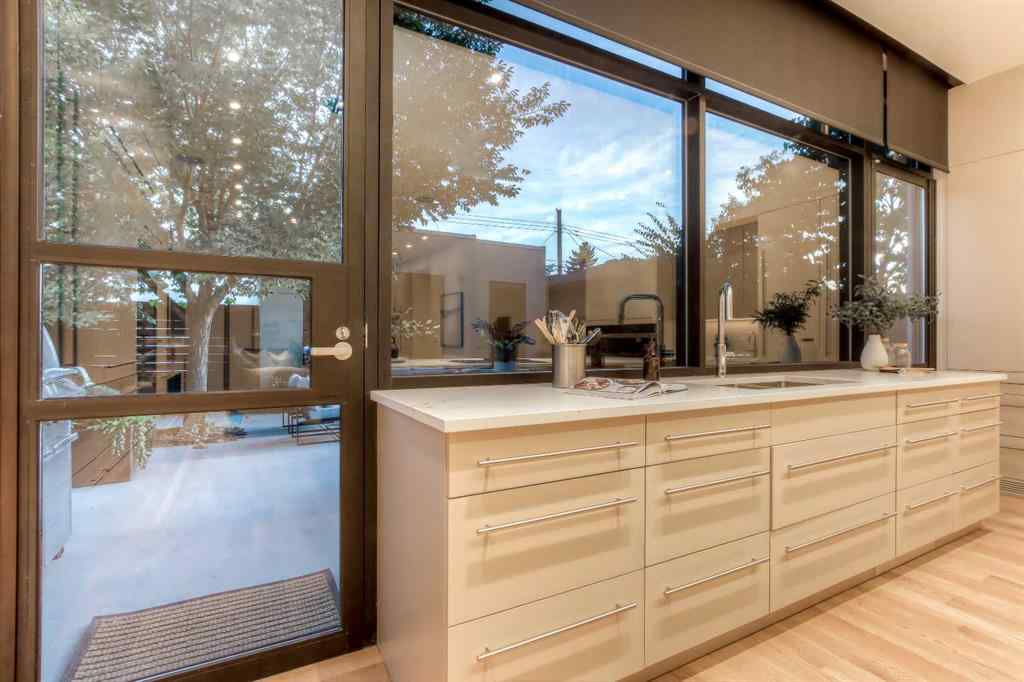 MLS® A2260248 - 2103 6 Avenue NW in West Hillhurst Calgary, Residential