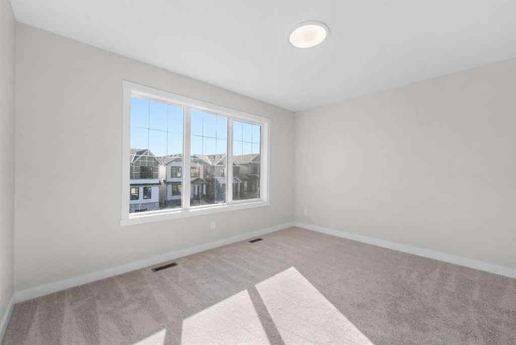 MLS® A2260276 - 715 Buffaloberry Manor SE in NONE Calgary, Residential