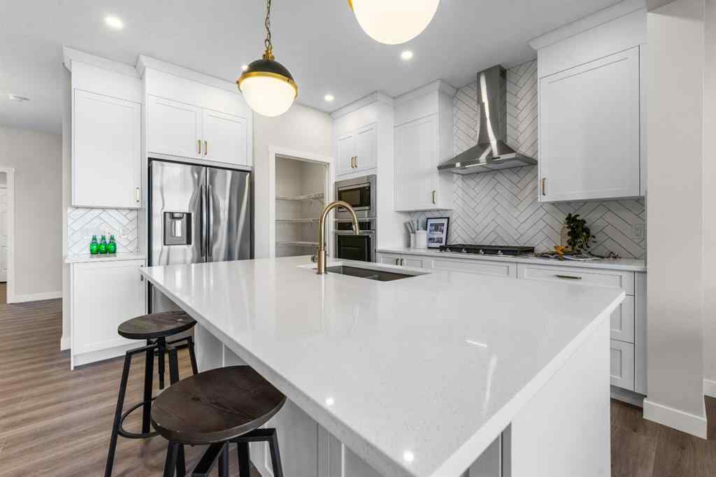 MLS® A2260276 - 715 Buffaloberry Manor SE in NONE Calgary, Residential