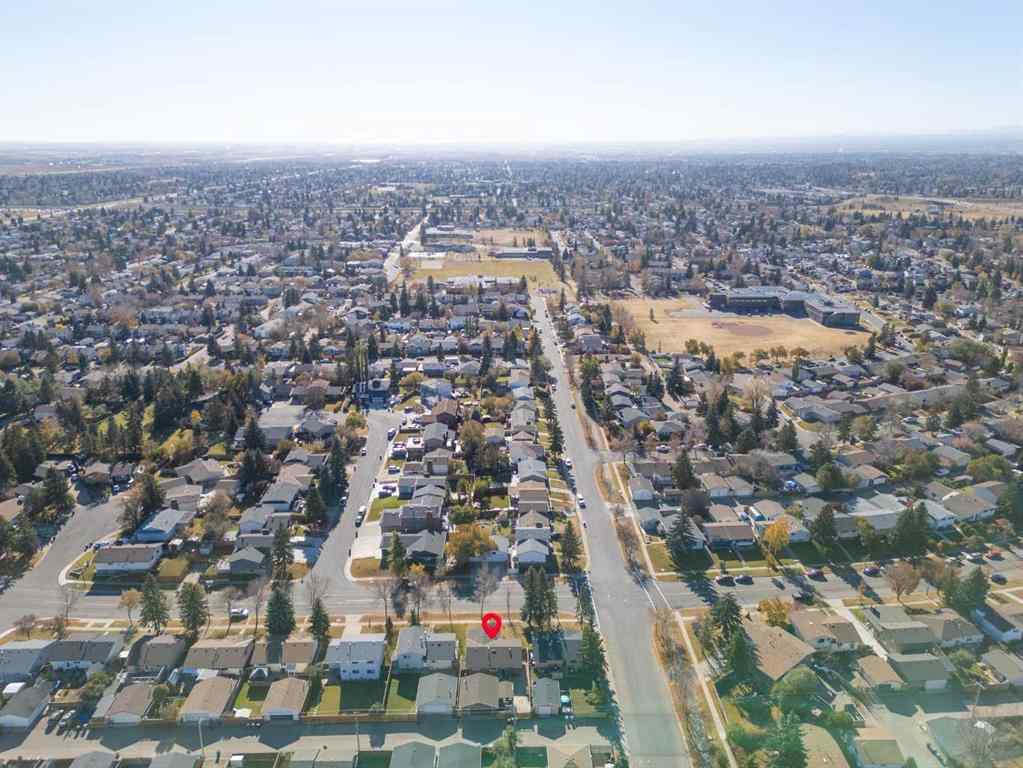 MLS® A2260304 - 6108 28 Avenue NE in Pineridge Calgary, Residential