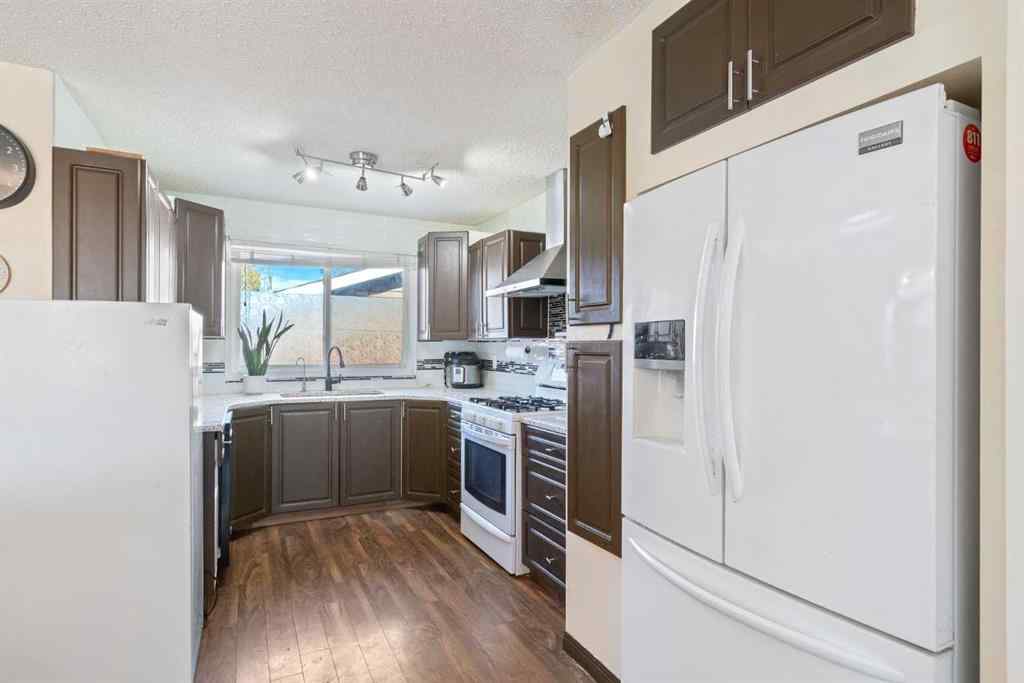 MLS® A2260304 - 6108 28 Avenue NE in Pineridge Calgary, Residential