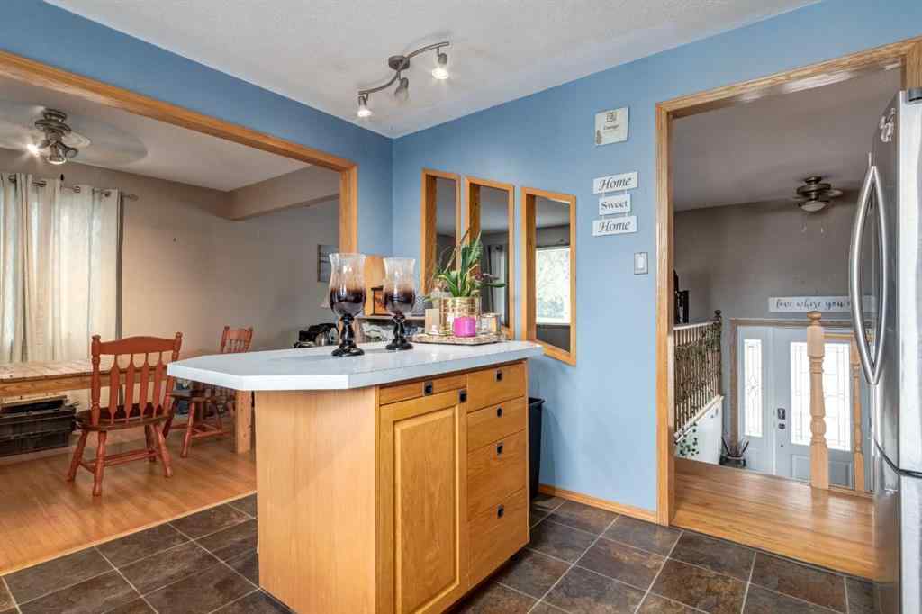 MLS® A2260325 - 7711 Bowcliffe Crescent NW in Bowness Calgary, Residential