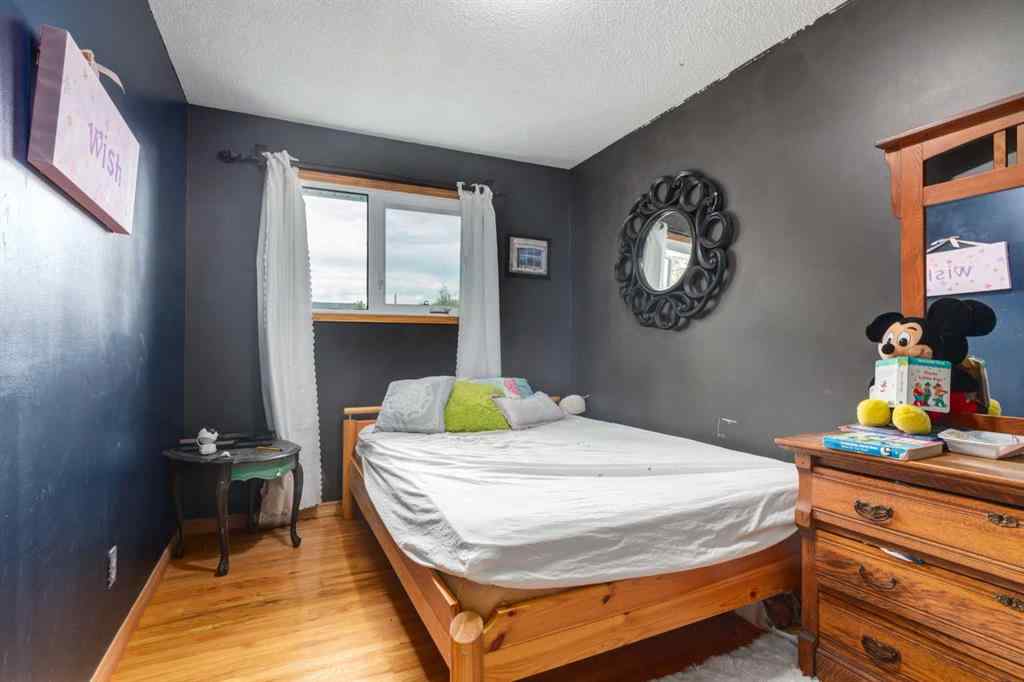 MLS® A2260325 - 7711 Bowcliffe Crescent NW in Bowness Calgary, Residential