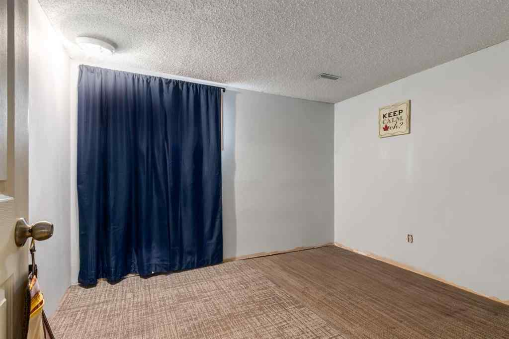 MLS® A2260325 - 7711 Bowcliffe Crescent NW in Bowness Calgary, Residential