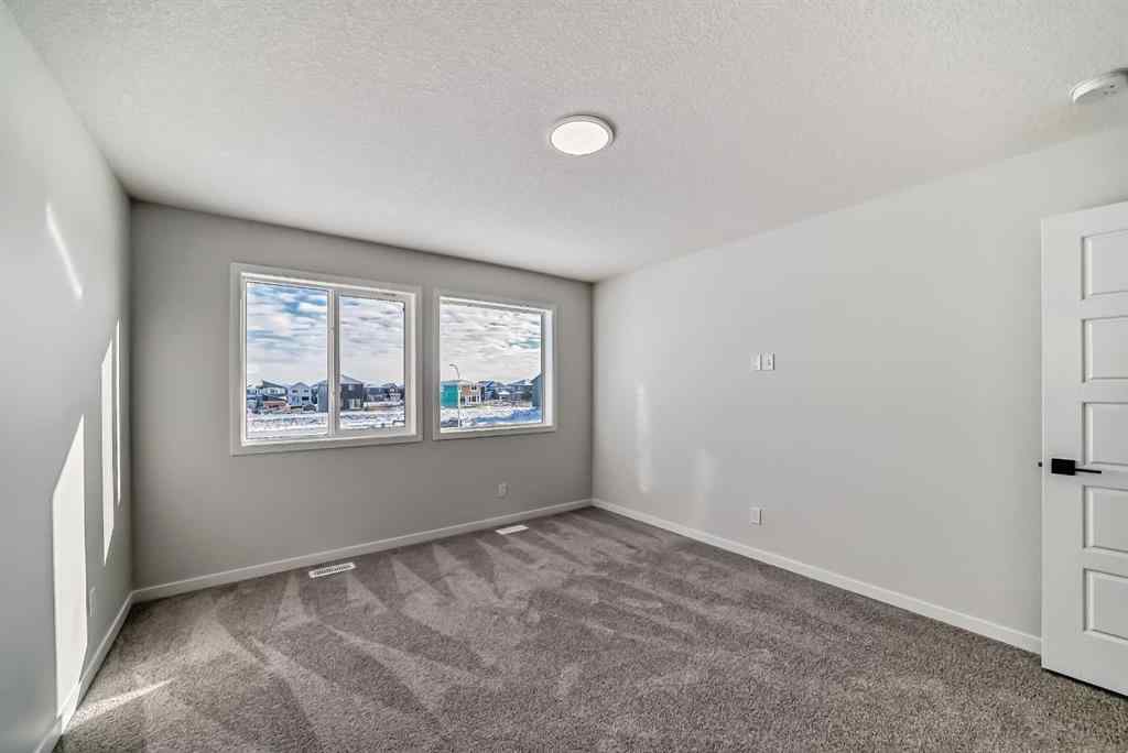 MLS® A2260335 - 374 Corner Glen Way NE in Cornerstone Calgary, Residential